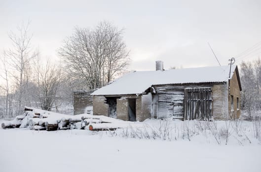 Terrible and scary abandoned house in winter period