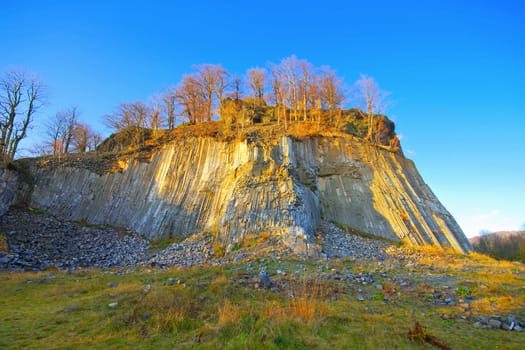 Golden mountain in Bohemian Switzerland, old basalt quarry