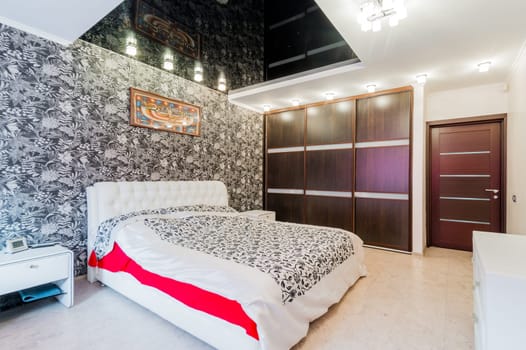 Russia, Moscow- July 23, 2019: interior room apartment. standard repair decoration in hostel. bedroom with bed