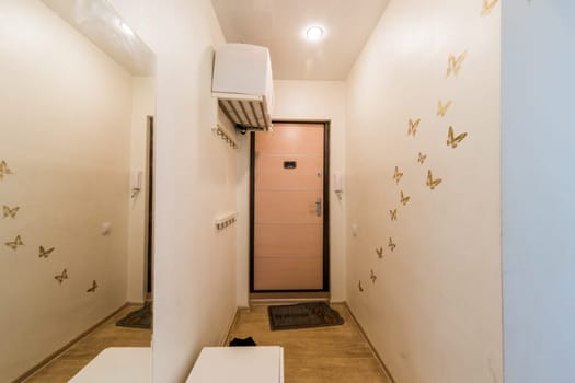 Russia, Moscow- July 23, 2019: interior room apartment. standard repair decoration in hostel. room doors, repair corridor