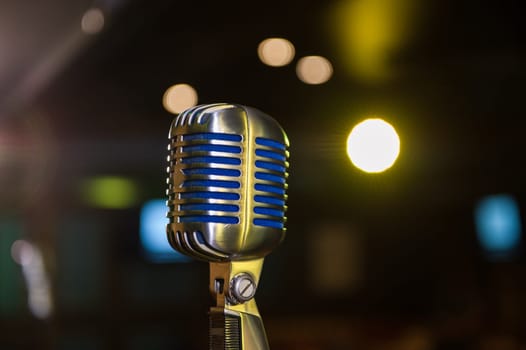 Close-up of retro microphone at concert