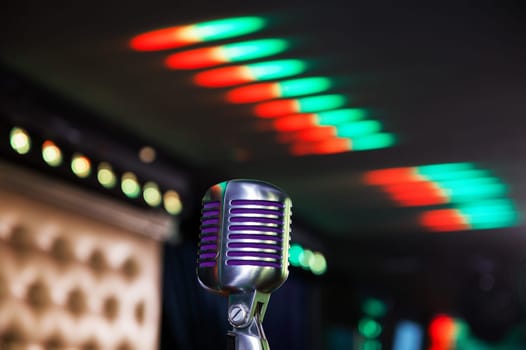 Close-up of retro microphone at concert