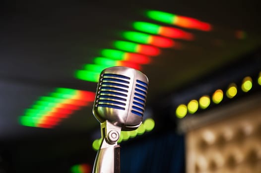 Close-up of retro microphone at concert
