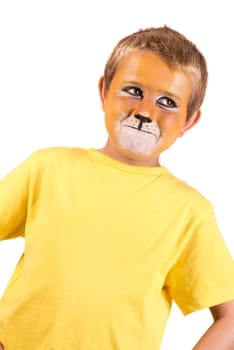 Boy with lion face-paint behind a white board