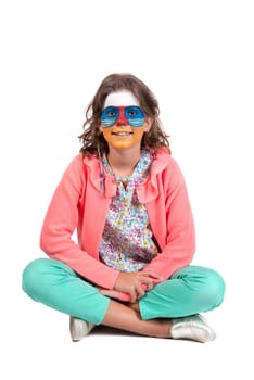 Girl with animal face-paint isolated in white