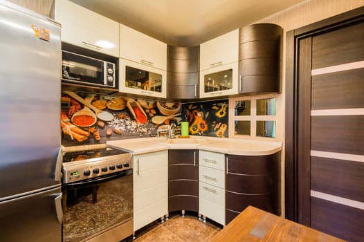 Russia, Moscow- August 01, 2019: interior room apartment. standard repair decoration in hostel. kitchen, dining area