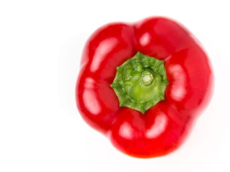 Red sweet pepper in a row on a white background. Copy space.