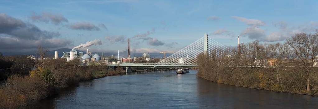 barge in front of industrial plants on the main river in frankfurt hoechst