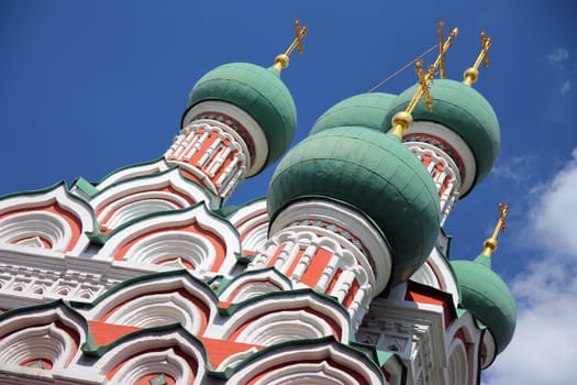 The teal domes of a church in the kremlin