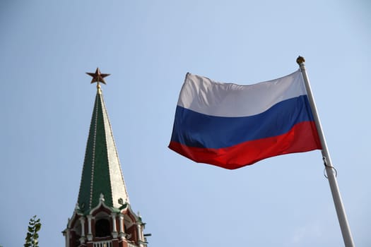 The Russian flag with the Kremlin on the back