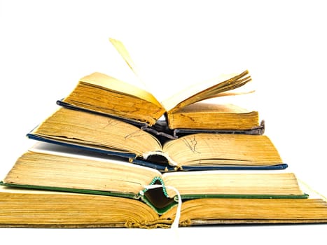 A stack of old books with place for text on a white background. Yellow Pages. Free place. Background image.