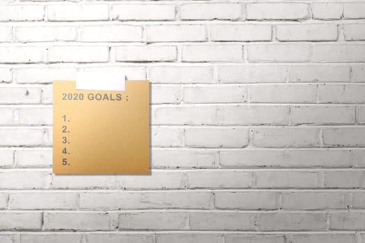 Empty list for 2020 goals in the paper stuck on the wall. Goals of 2020. Happy New Year 2020
