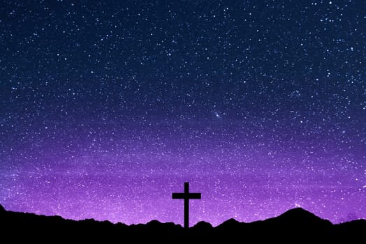 Christian Cross on the field with a night scene background