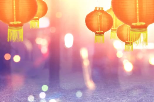 Chinese lanterns hanging with blurred lights background