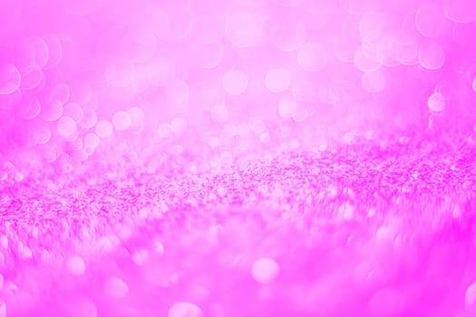 Glitter light abstract pink bokeh valentine light blurred background