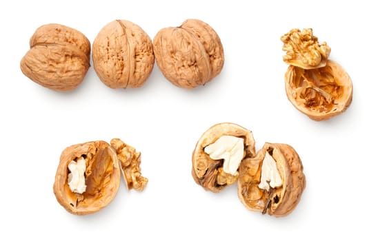 Walnuts isolated on white background. Top view, flat lay