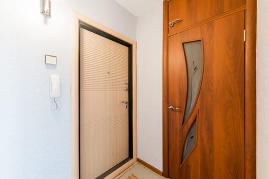 Russia, Moscow- August 01, 2019: interior room apartment. standard repair decoration in hostel. room doors, repair corridor