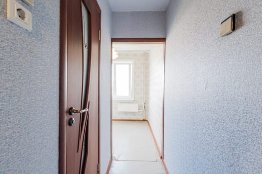 Russia, Moscow- August 01, 2019: interior room apartment. standard repair decoration in hostel. room doors, repair corridor