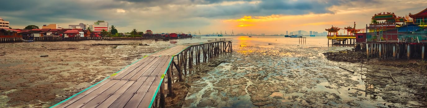 Beautiful view of sunrise at Penang. Yeoh jetty on the foreground.  Malaysia. Panorama