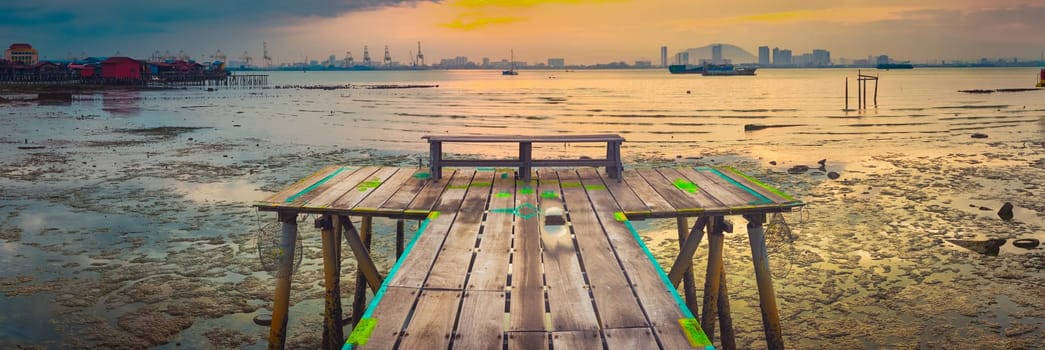 Beautiful view of sunrise at Penang. Yeoh jetty on the foreground.  Malaysia. Panorama