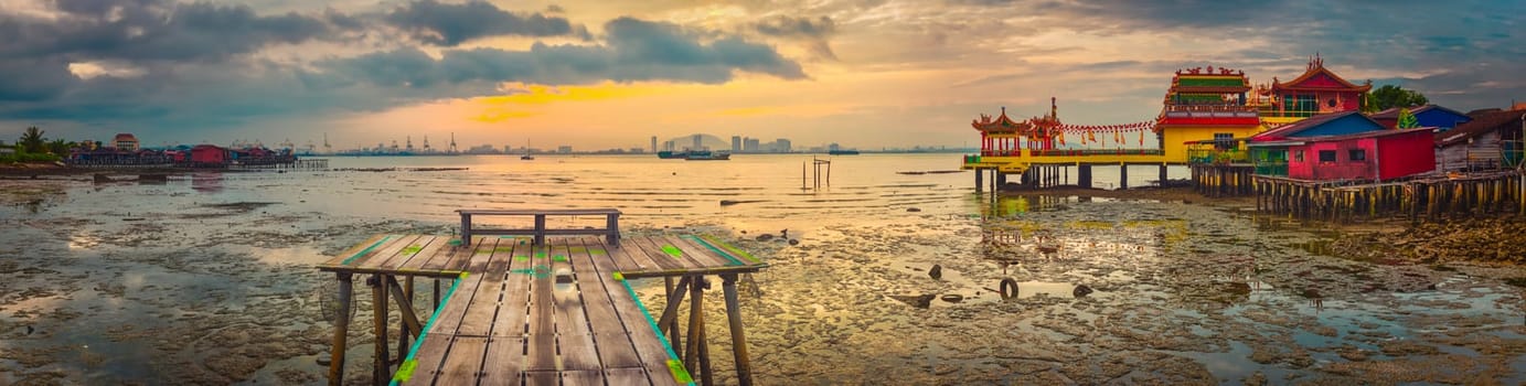 Beautiful view of  Yeoh jetty and Hean Boo Thean Kuan Yin Temple at sunrise. Penang,  Malaysia. Panorama
