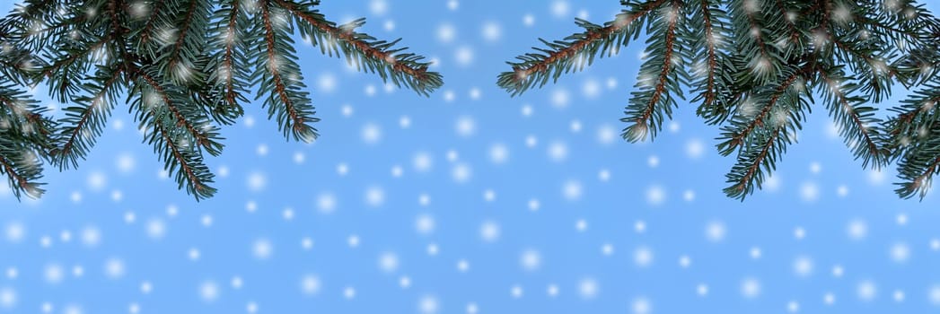 Christmas background fir branches and snowflakes against the blue sky