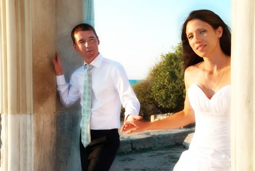 Beautiful wedding couple - bride and groom in the greece ancient city