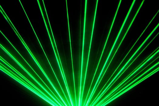 Luxury entertainment in nightclub event, festival, concert or New Years Eve. Ray beams are symbol for science and universe research.
