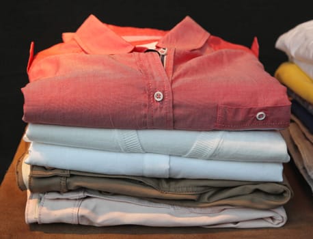Stack of clean modern clothes