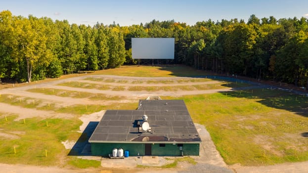 The snack bar sound poles and projection screen still stand at this old Drive In