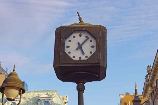 Public clock at pole in Belgrade Serbia