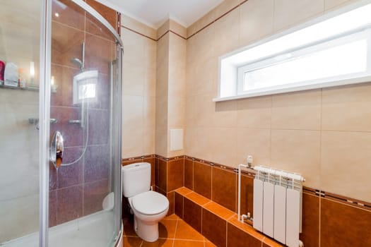 Russia, Omsk- August 02, 2019: interior room apartment. standard repair decoration in hostel. bathroom, sink, decoration elements, toilet