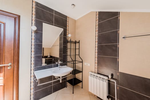 Russia, Omsk- August 02, 2019: interior room apartment. standard repair decoration in hostel. bathroom, sink, decoration elements, toilet