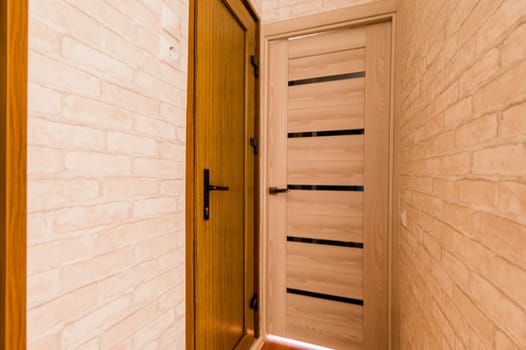 Russia, Omsk- August 02, 2019: interior room apartment. standard repair decoration in hostel. room doors, repair corridor