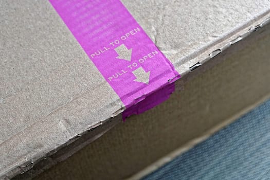 Pull to open easy strip at box