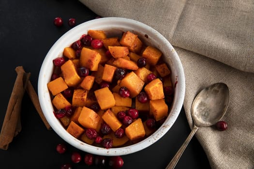 Baked butternut squash and cranberries with honey and cinnamon, just out of the oven.