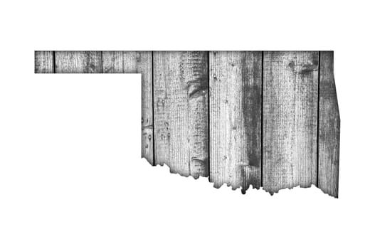 Map of Oklahoma on weathered wood
