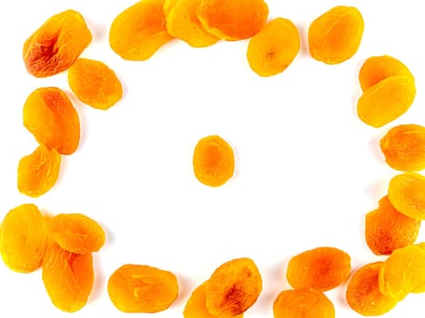 Dried apricots fruits on a white background with place for text. Free place. Background image. Food photo.