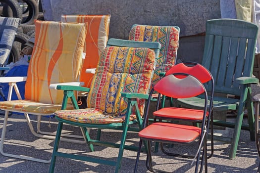 Various colors and shapes of garden chairs furniture