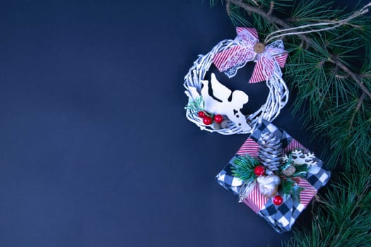 Handmade star decorated with cones and cranberries with christmas deer