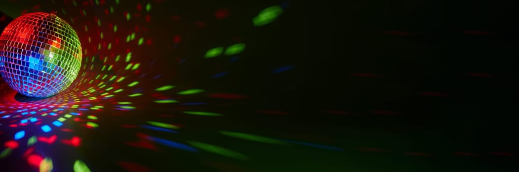 Glittering mirror disco ball. Nightclub.
