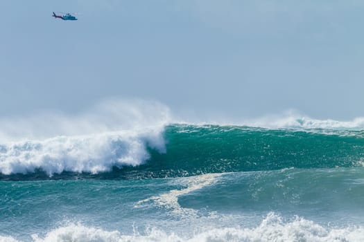 Ocean Wave crashing breaking swells cresting  closeup hollow scenic sea power energy of nature