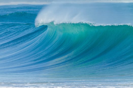 Ocean Wave crashing breaking swells cresting  closeup hollow scenic sea power energy of nature
