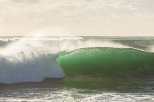 Ocean Wave crashing breaking swells cresting  closeup hollow scenic sea power energy of nature