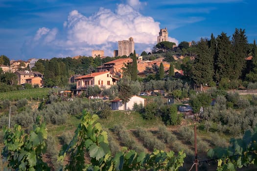 in the distance the towers of San Gimigniano