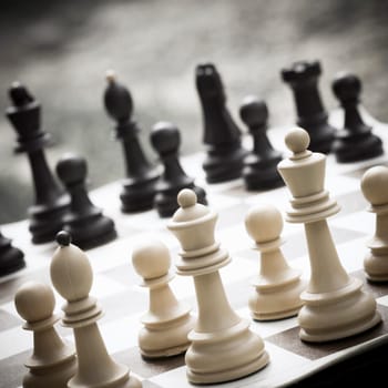 Battle on the chessboard, chess leisure game, strategy concept.
