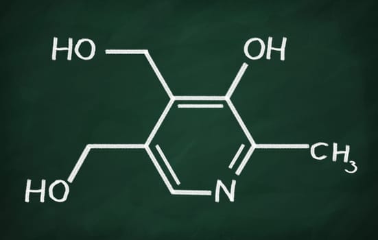 Structural model of Vitamin B6 on the blackboard.
