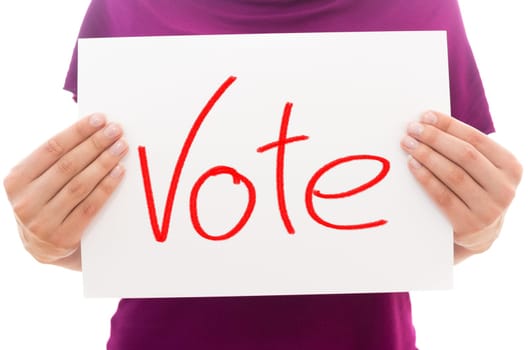 Girl holding white paper sheet with text Vote