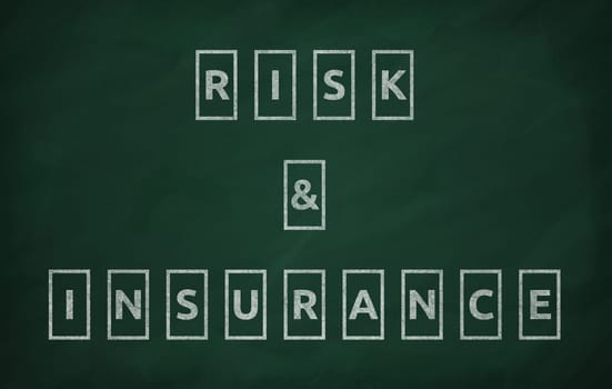 Risk and insurance written on the blackboard
