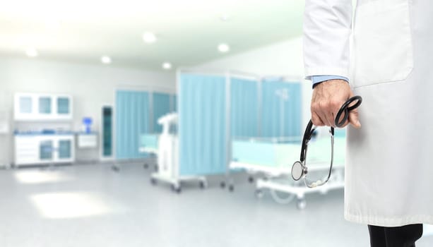 detail of a doctor holding a stethoscope inside a hospital. Concept of walfare